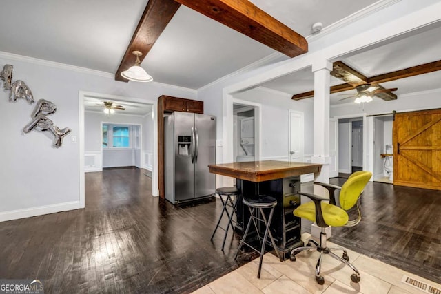 1747 Parkhill Dr, Decatur, GA 30032 - kitchen with stainless steel fridge with ice dispenser, stacked washing machine and dryer, ceiling fan, dark wood-style floors, and beamed ceiling