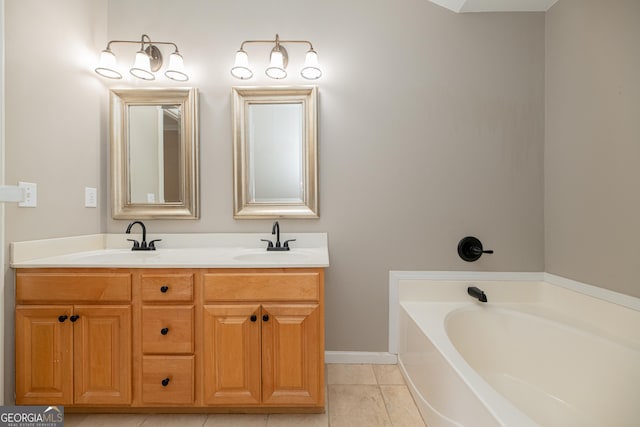 2427 Camata Pl, Marietta, GA 30066 - bathroom with a garden tub, double vanity, and tile patterned flooring