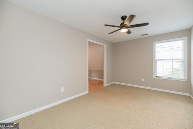 2427 Camata Pl, Marietta, GA 30066 - unfurnished room featuring light carpet and a ceiling fan