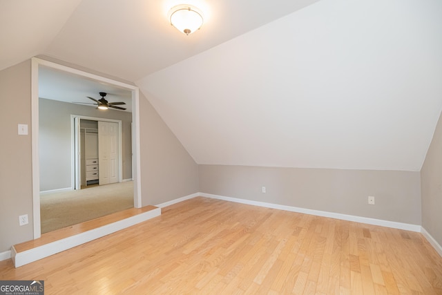2427 Camata Pl, Marietta, GA 30066 - additional living space with vaulted ceiling, light wood finished floors, and ceiling fan