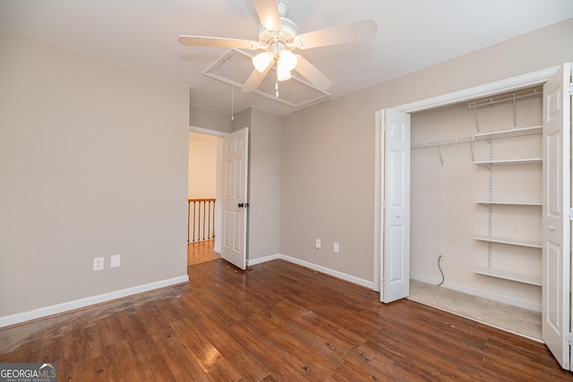 2427 Camata Pl, Marietta, GA 30066 - unfurnished bedroom with attic access, wood finished floors, a closet, and a ceiling fan