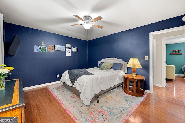 3149 Buford Hwy NE, Atlanta, GA 30329 - bedroom with wood finished floors and ceiling fan