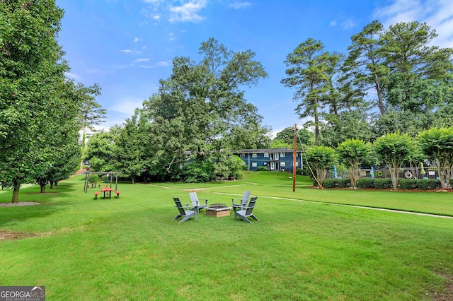 3149 Buford Hwy NE, Atlanta, GA 30329 - view of community featuring a lawn and an outdoor fire pit