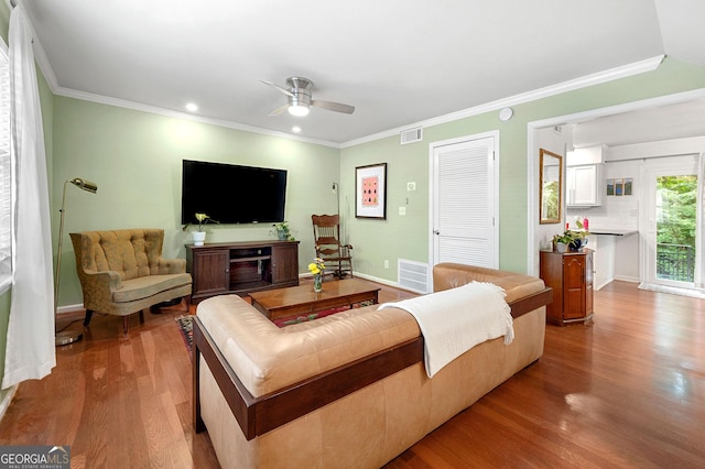 3149 Buford Hwy NE, Atlanta, GA 30329 - living room featuring wood finished floors, ceiling fan, ornamental molding, and recessed lighting