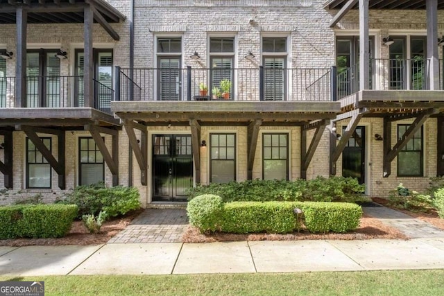 18 Peachtree Ave NE Unit 5, Atlanta, GA 30305 - view of exterior entry with brick siding