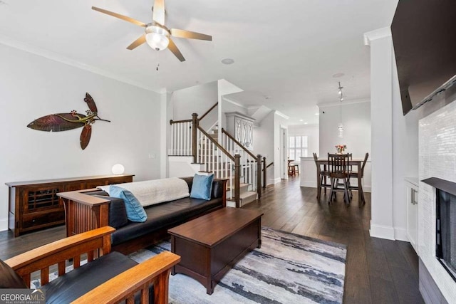 18 Peachtree Ave NE Unit 5, Atlanta, GA 30305 - living room with ornamental molding, stairs, hardwood / wood-style flooring, and a ceiling fan