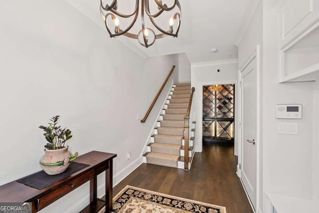 18 Peachtree Ave NE Unit 5, Atlanta, GA 30305 - entryway with stairs, dark wood-style floors, a chandelier, and ornamental molding