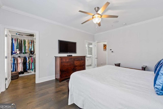 18 Peachtree Ave NE Unit 5, Atlanta, GA 30305 - bedroom featuring dark wood-style flooring, a spacious closet, crown molding, a closet, and a ceiling fan