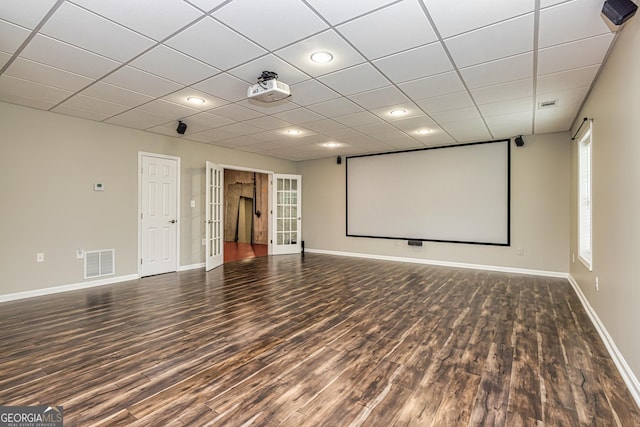 24 Arendt Park Ln, Newnan, GA 30263 - cinema room featuring wood finished floors and a paneled ceiling