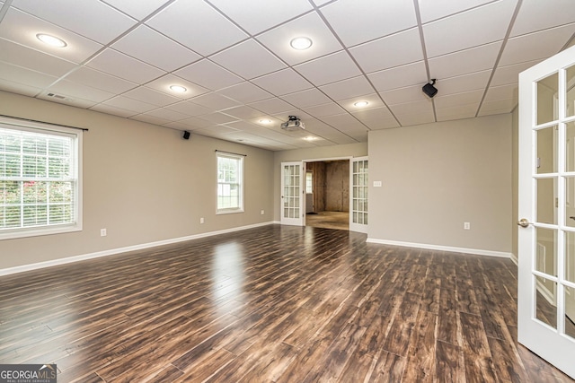 24 Arendt Park Ln, Newnan, GA 30263 - unfurnished room with dark wood-type flooring, french doors, a paneled ceiling, and recessed lighting
