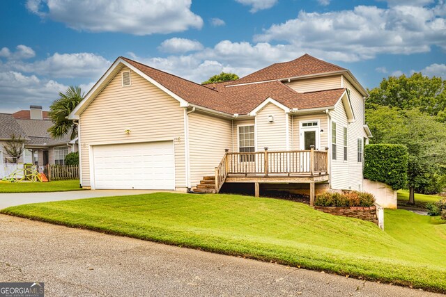 24 Arendt Park Ln, Newnan, GA 30263 - traditional-style house with a front yard, driveway, an attached garage, and roof with shingles
