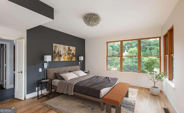 497 Rutherford St, Athens, GA 30606 - bedroom featuring wood finished floors and baseboards