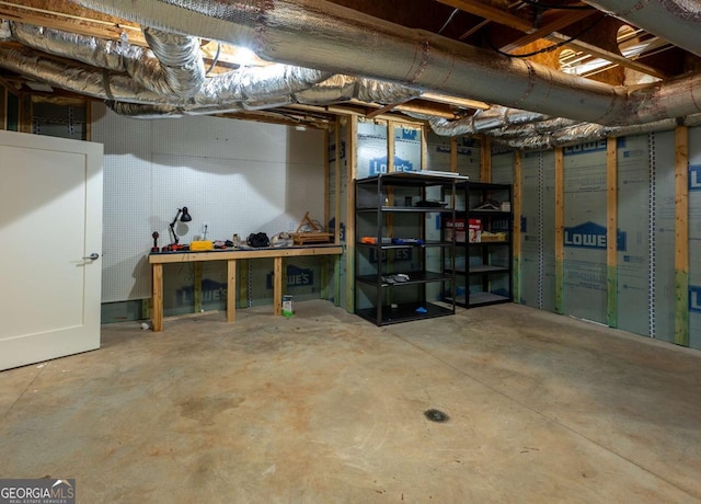 497 Rutherford St, Athens, GA 30606 - unfinished below grade area featuring a workshop area
