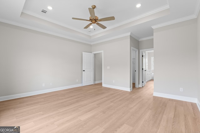 10 Honeysuckle Dr, Claxton, GA 30417 - unfurnished room with a raised ceiling, ceiling fan, light wood-style floors, crown molding, and recessed lighting