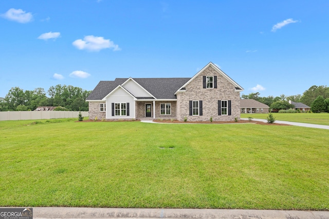 10 Honeysuckle Dr, Claxton, GA 30417 - view of front of house featuring brick siding and a shingled roof