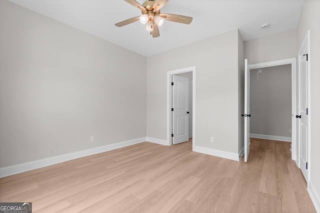 10 Honeysuckle Dr, Claxton, GA 30417 - unfurnished bedroom with light wood-type flooring and a ceiling fan