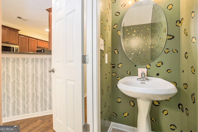 113 Macalester Dr, Newnan, GA 30265 - bathroom with wood finished floors and baseboards