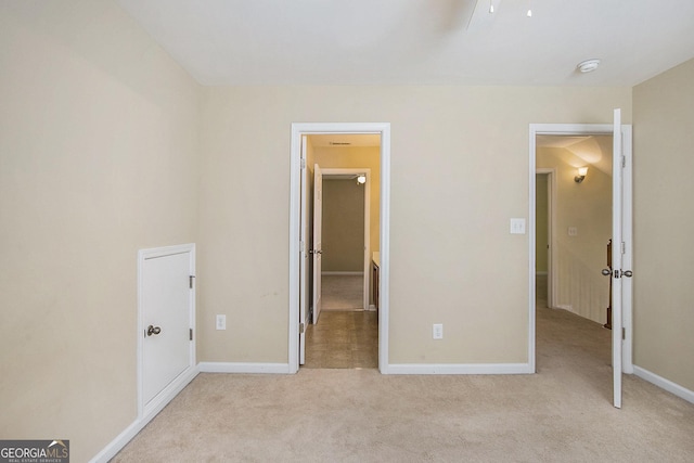 113 Macalester Dr, Newnan, GA 30265 - unfurnished bedroom featuring light colored carpet and baseboards