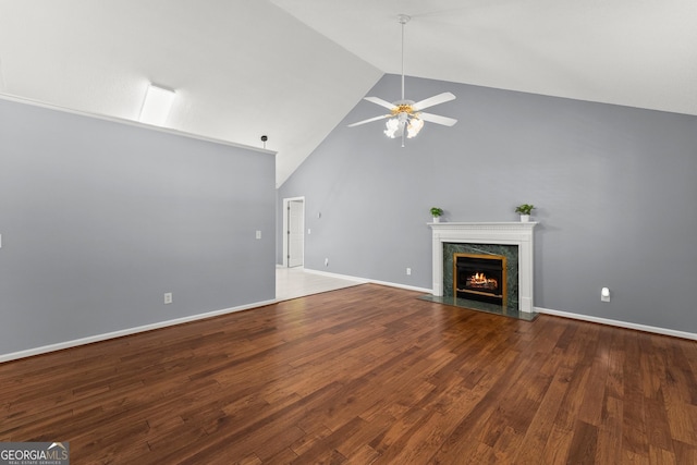 132 J Mountain Dr, Dahlonega, GA 30533 - unfurnished living room featuring a ceiling fan, a fireplace, high vaulted ceiling, and wood finished floors