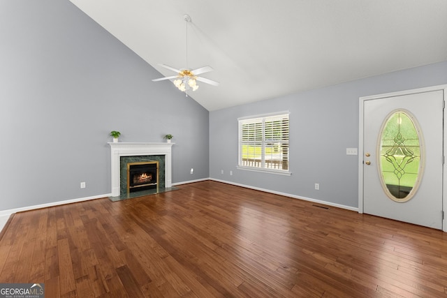 132 J Mountain Dr, Dahlonega, GA 30533 - unfurnished living room featuring a ceiling fan, wood finished floors, a high end fireplace, and high vaulted ceiling