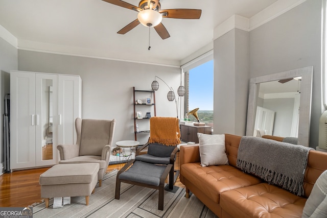 75 Ponce De Leon Ave NE Unit 1004, Atlanta, GA 30308 - living area with ceiling fan, wood finished floors, and ornamental molding