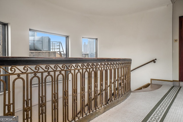 75 Ponce De Leon Ave NE Unit 1004, Atlanta, GA 30308 - stairs with carpet flooring and a city view