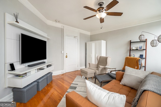 75 Ponce De Leon Ave NE Unit 1004, Atlanta, GA 30308 - living room with a ceiling fan, light wood-style flooring, and crown molding