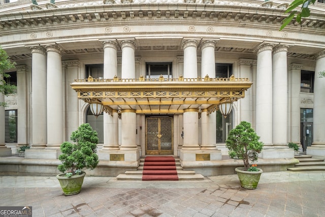 75 Ponce De Leon Ave NE Unit 1004, Atlanta, GA 30308 - entrance to property featuring stone siding and a balcony