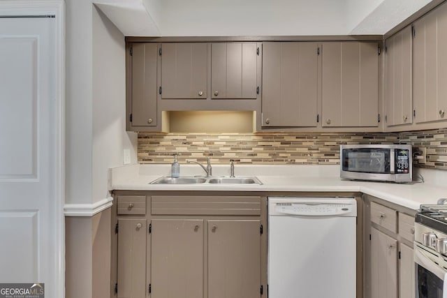 289 Westland Way SW, Marietta, GA 30064 - kitchen featuring appliances with stainless steel finishes, light countertops, tasteful backsplash, and gray cabinets