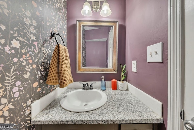 289 Westland Way SW, Marietta, GA 30064 - bathroom featuring vanity, a chandelier, and wallpapered walls