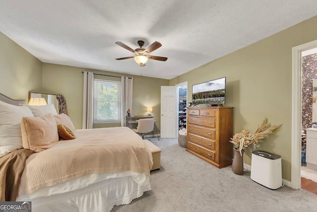 289 Westland Way SW, Marietta, GA 30064 - bedroom with light carpet, ceiling fan, and a textured ceiling