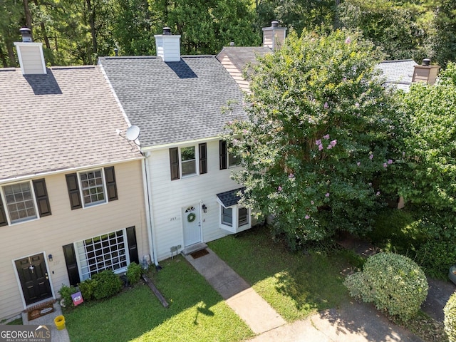 289 Westland Way SW, Marietta, GA 30064 - view of front of property with a chimney, a shingled roof, and a front yard
