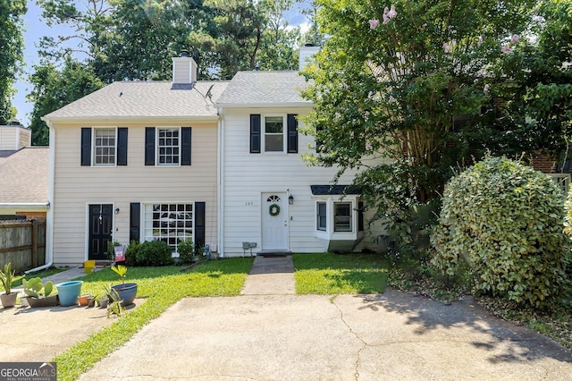 289 Westland Way SW, Marietta, GA 30064 - townhome / multi-family property with a chimney and roof with shingles