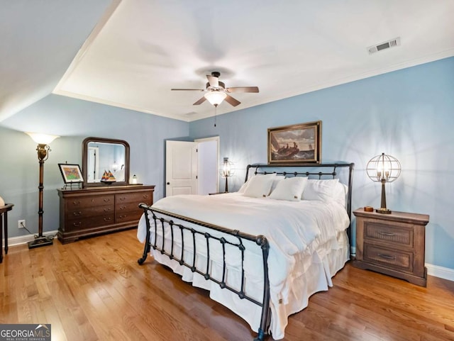 2392 Crimson King Dr, Braselton, GA 30517 - bedroom featuring wood finished floors, a ceiling fan, and ornamental molding