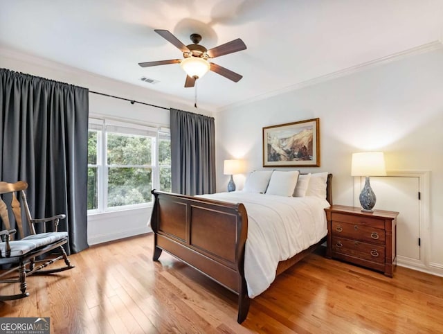 2392 Crimson King Dr, Braselton, GA 30517 - bedroom featuring ornamental molding, light wood-style floors, and ceiling fan