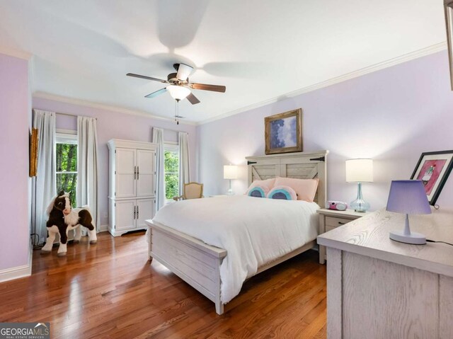 2392 Crimson King Dr, Braselton, GA 30517 - bedroom featuring ornamental molding, wood finished floors, and ceiling fan