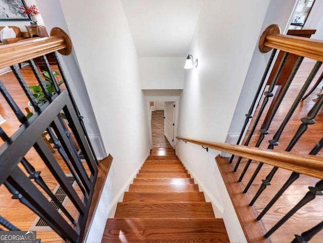 2392 Crimson King Dr, Braselton, GA 30517 - staircase with wood finished floors and a high ceiling