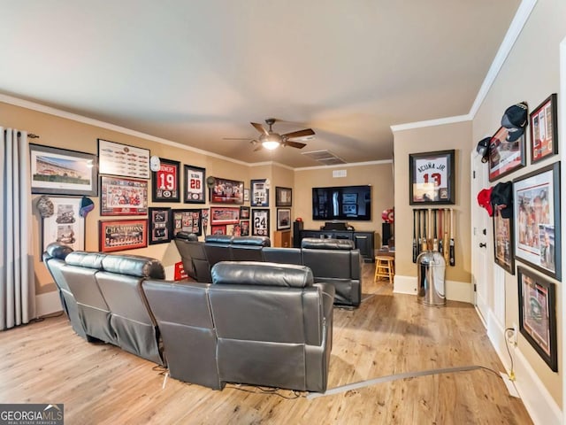 2392 Crimson King Dr, Braselton, GA 30517 - living area featuring a ceiling fan, wood finished floors, and ornamental molding