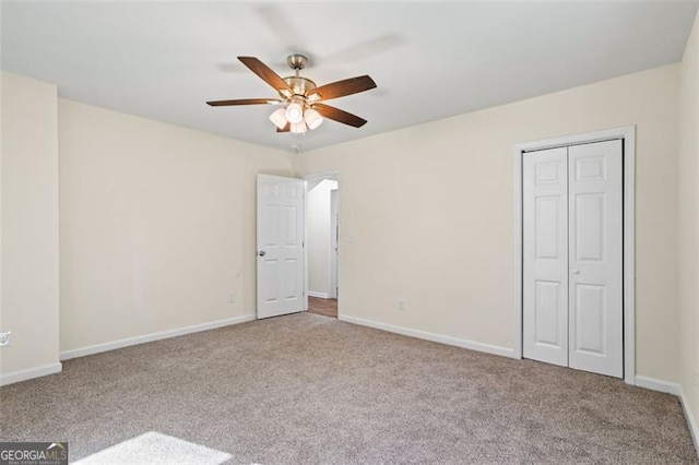 1270 Graymont Dr, Atlanta, GA 30310 - unfurnished bedroom featuring carpet flooring, a closet, and a ceiling fan