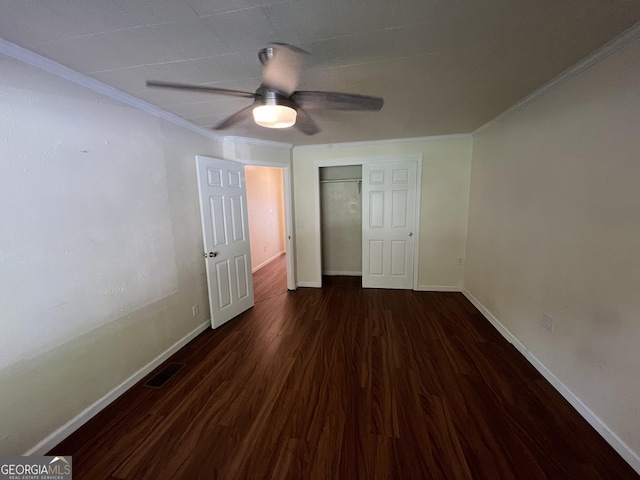 9 Henry St, Statesboro, GA 30458 - unfurnished bedroom with ornamental molding, wood finished floors, a closet, and ceiling fan