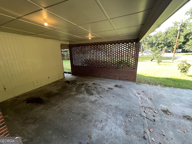 9 Henry St, Statesboro, GA 30458 - garage featuring an attached carport