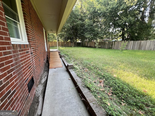 9 Henry St, Statesboro, GA 30458 - fenced backyard featuring a deck