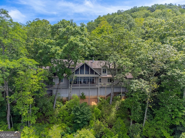 4 Dean Ln, Tiger, GA 30576 - rear view of house with a wooded view