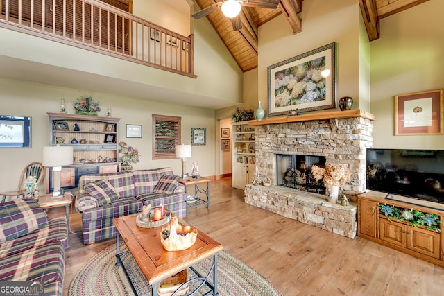 4 Dean Ln, Tiger, GA 30576 - living room with a fireplace, a ceiling fan, high vaulted ceiling, wood finished floors, and a wooden ceiling with exposed beams