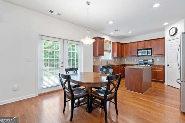 1609 Vinery Ln SE, Mableton, GA 30126 - dining space featuring light wood-style floors, recessed lighting, and french doors