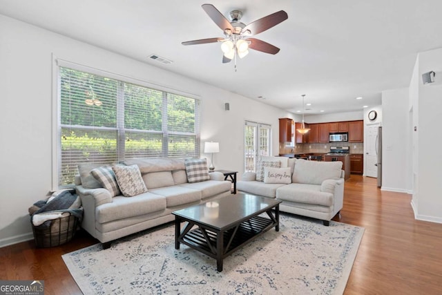 1609 Vinery Ln SE, Mableton, GA 30126 - living room featuring a ceiling fan, light wood-style flooring, and recessed lighting