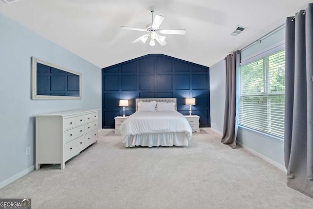 1609 Vinery Ln SE, Mableton, GA 30126 - bedroom featuring vaulted ceiling, light colored carpet, and a ceiling fan