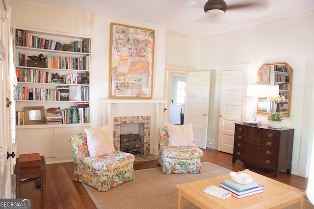 1557 18th Ave, Columbus, GA 31901 - living area with ceiling fan, wood finished floors, and a tile fireplace