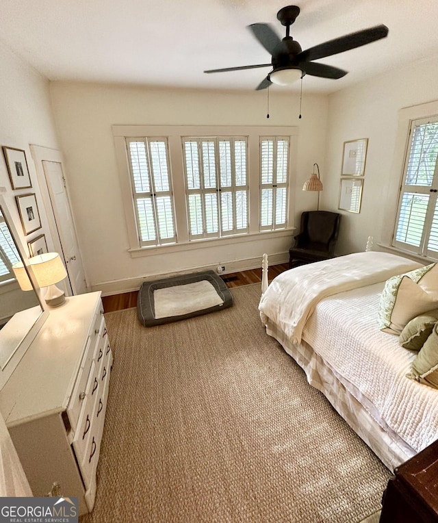 1557 18th Ave, Columbus, GA 31901 - bedroom with wood finished floors and a ceiling fan
