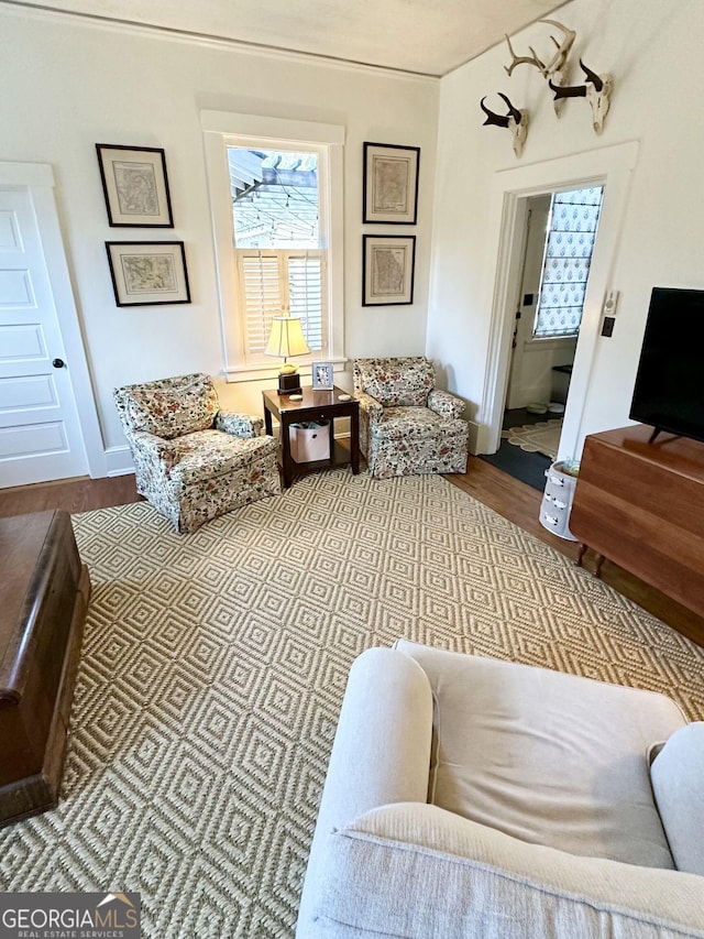 1557 18th Ave, Columbus, GA 31901 - living area with wood finished floors and baseboards